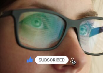 Hand cursor clicking on YouTube buttons